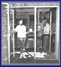 picture of carhop exiting door with food tray in hand 1965